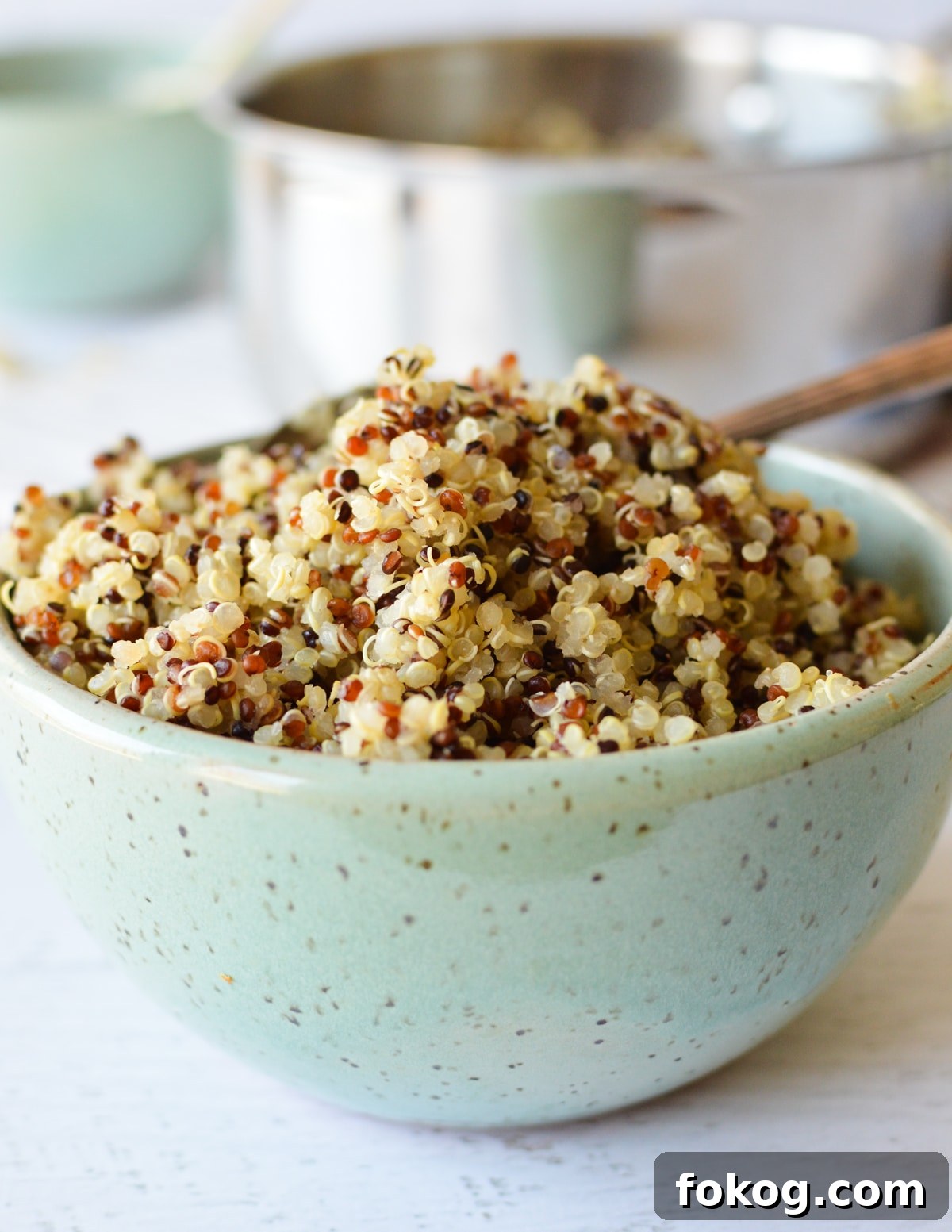 How to Cook Tri-Color Quinoa: Perfect Fluffy Results 7 a bowl of cooked tri-color quinoa.