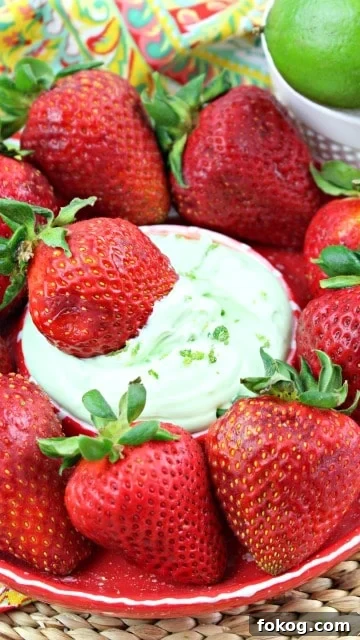 strawberry dipped in key lime cheesecake dip