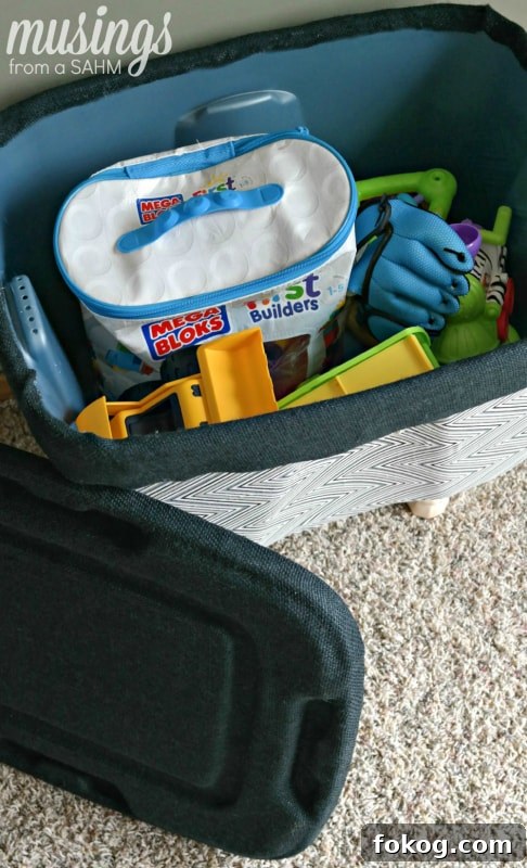 DIY Toy Box Makeover: How to turn an ugly plastic bin into a decorated toy box!