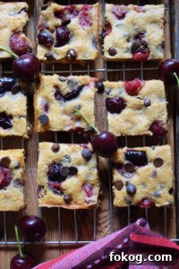 cherry chocolate chip blondies on a cooling rack